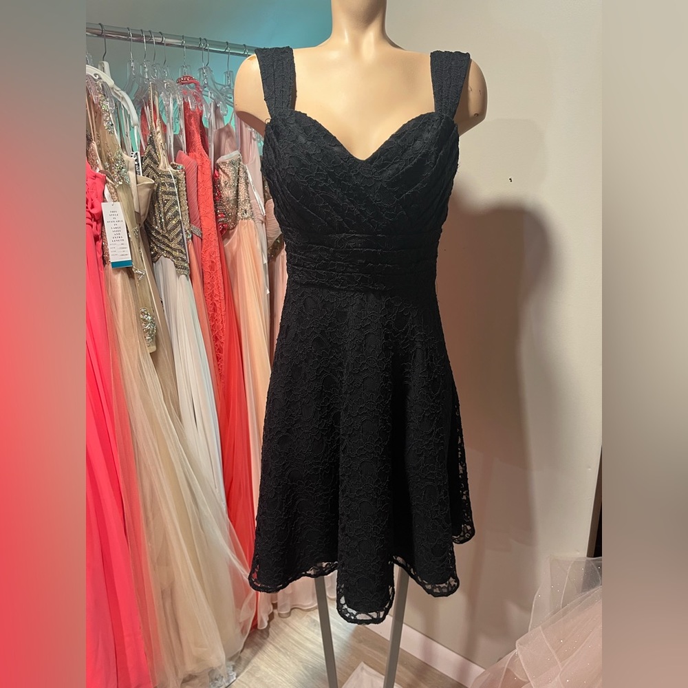 Mori Lee Size 12. Black dress with Black Lace and Button detail up the back.